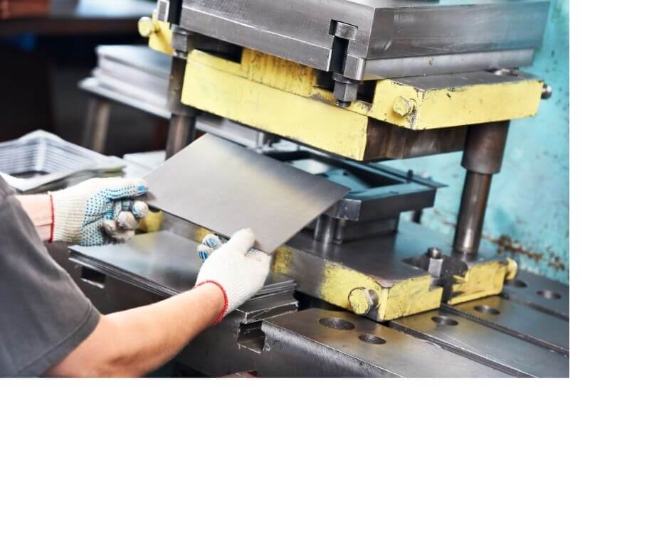 worker-operating-metal-sheet-press-machine